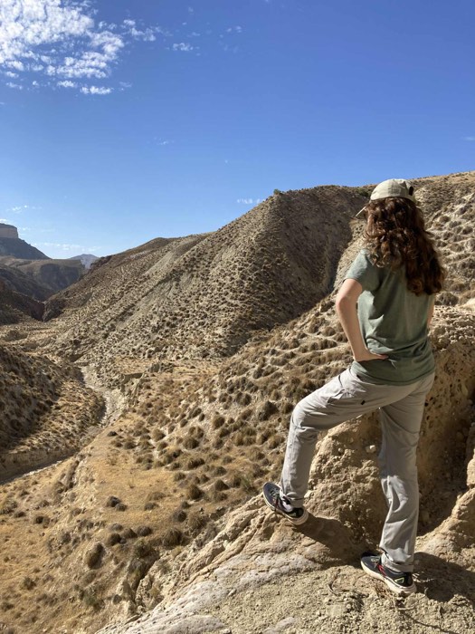 Emily, the maker of Fossil Forecast, fossil hunting on the coast